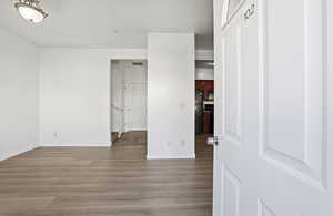 Empty room featuring light wood-style floors and baseboards