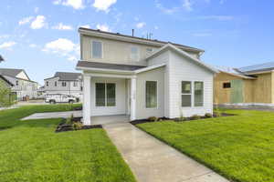 View of front facade with a front lawn