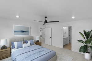Bedroom featuring light colored carpet, recessed lighting, ensuite bath, and a ceiling fan