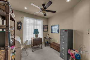 Office area with light carpet, recessed lighting, and ceiling fan