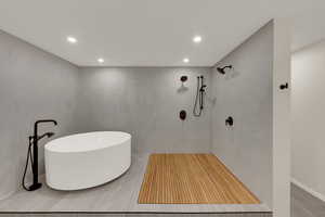 Primary Bathroom with double shower & soak tub