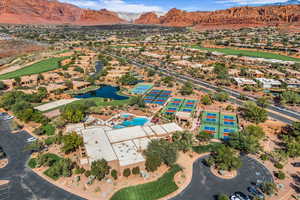 Aerial view of a golf club and a water and mountain view