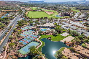 Aerial overview of property's location featuring a water and mountain view