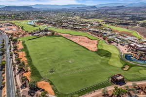 Aerial overview of property's location featuring a water and mountain view