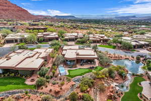 Aerial view of residential area featuring a mountainous background