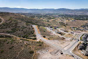 View of property location with a mountain backdrop and rural landscape