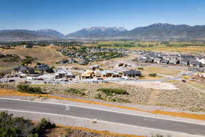 View of mountain background featuring nearby suburban area