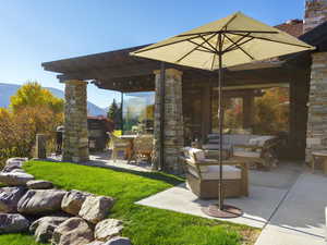 View of patio / terrace featuring a mountain view and a pergola