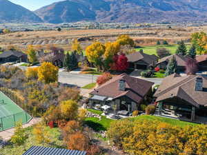 Aerial view of residential area with a mountainous background
