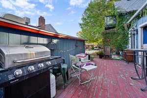 Deck featuring area for grilling