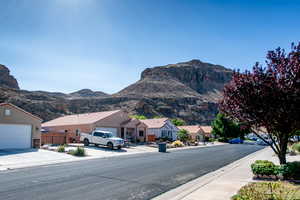 View of mountain backdrop with nearby suburban area