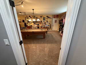 Rec room featuring carpet floors, pool table, and track lighting