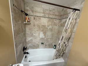 Bathroom featuring shower / bath combo