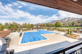 Community pool featuring a mountain view