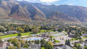 Aerial view of residential area with mountains