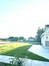 View of yard with an outdoor structure
