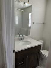 Bathroom featuring vanity and a shower