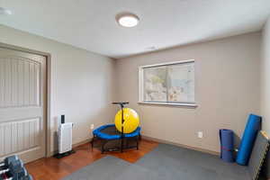 Living area featuring wood finished floors and baseboards