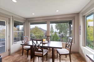 Dining area featuring baseboards and recessed lighting