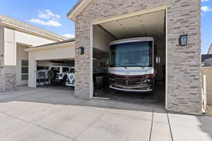 Garage with concrete driveway