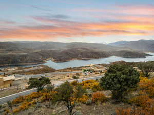 View of mountain backdrop featuring a large body of water