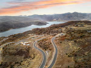 Aerial view at dusk of a water and mountain view