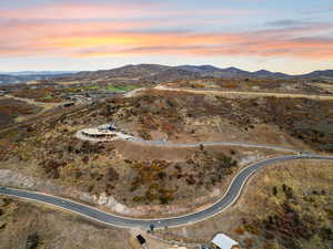 Aerial view of property's location featuring mountains