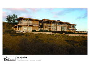 View of property at dusk