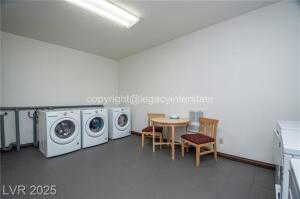 Washroom with washing machine and dryer