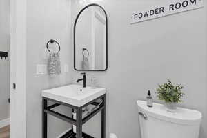 Half bathroom featuring toilet