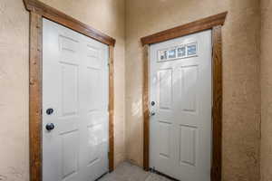 Front door entrance on ground level and garage access