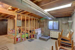 Basement featuring electric panel