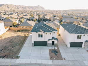 Aerial view of residential area with mountains