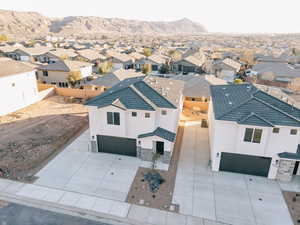 Aerial view of residential area with mountains