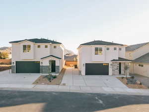 Modern farmhouse with stone siding and stucco siding
