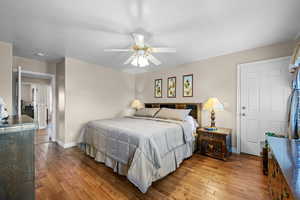 Bedroom featuring light wood-style floors and ceiling fan