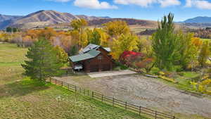 Aerial view of sparsely populated area featuring a mountain backdrop
