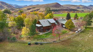 Aerial view of sparsely populated area featuring a mountain backdrop