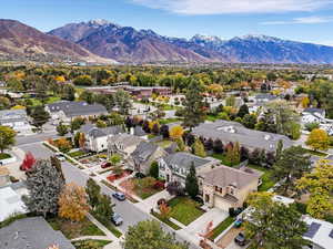 Aerial perspective of suburban area with a mountain backdrop