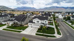 Aerial perspective of suburban area featuring mountains