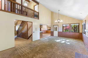 Family room with a loft above.