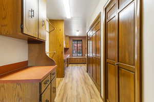 Laundry room and multipurpose room with lots of cabinets.