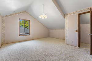 Loft bedroom with a walk-in closet.