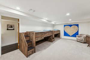 Bedroom featuring recessed lighting and carpet flooring