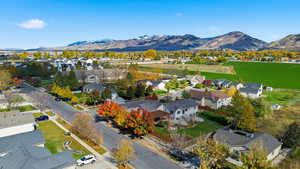 Aerial view of residential area with a mountainous background