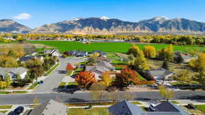 Aerial perspective of suburban area featuring mountains