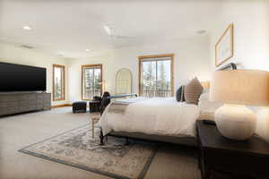 Bedroom featuring recessed lighting, multiple windows, carpet flooring, and ceiling fan
