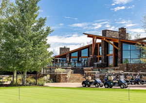 View of community with a putting green