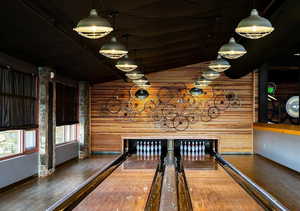 Rec room featuring bowling and vaulted ceiling