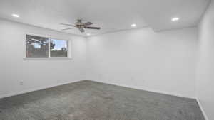 Unfurnished room with carpet flooring, recessed lighting, and a ceiling fan